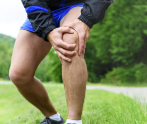 artrose knie symptomen